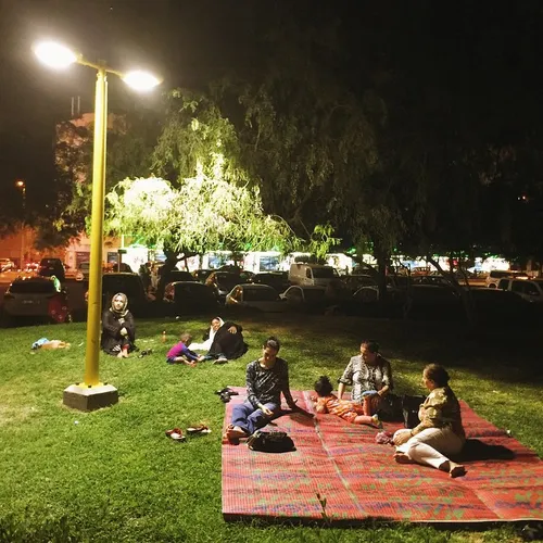 Residents of the Karama area in Dubai relax at a local pa