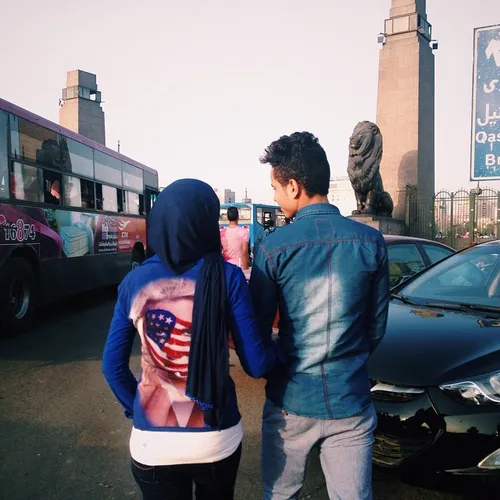 Photo by @alexkpotter - An Egyptian couple walk together 