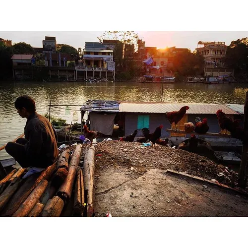 A worker get rest after working time by the river Cau in 