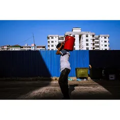 A man walks up 46th street in Yangon, Myanmar. @amcapture