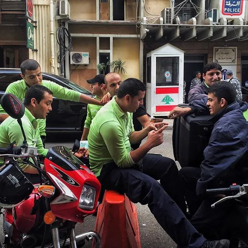 Delivery men outside of Zaatar&Zeit resturaunt, waiting f