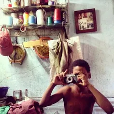 A young friend with an old camera in Havana.This is the s