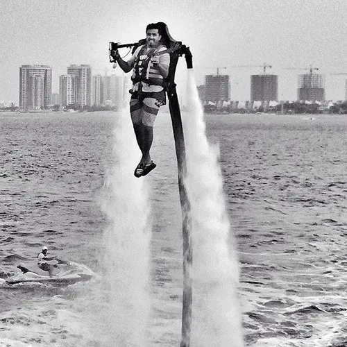 A man has fun in the coastal waters of Kish Island. Persi