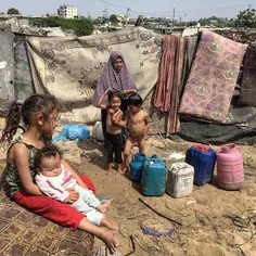 By @Wissamgaza Palestinian mother Samar Nemir, 35, washes
