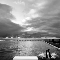 A swimmer dives in at the Merewether Ocean Baths. Simone 