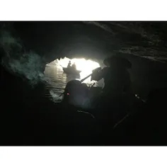 A tourist smokes and get relax during a boat-trip into na
