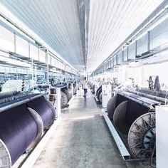 A room of denim looms in the industrial zone of Sadat Cit