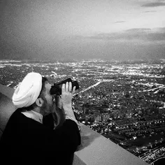 A clergy man looks at #Tehran from above Milad Tower, the