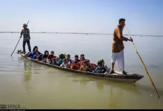 انتقال خطرناک چندین کودک در جریان سیل خوزستان