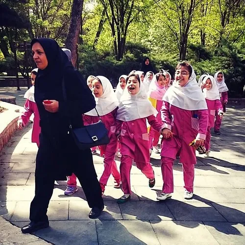 Elementary students on a visit to Melat Park. Mashhad, Ra