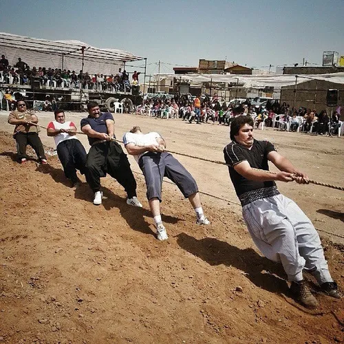 Participants in an open tug-of-war competition held on th