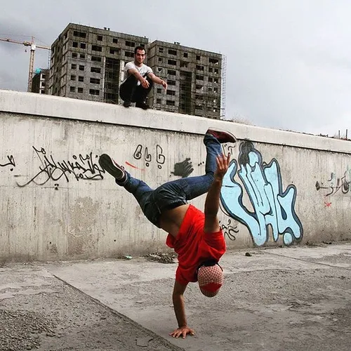 A b-boy practicing on street. Mashhad, RazaviKhorasan, Ir
