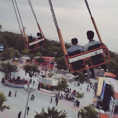 People have fun at Mellat Amusement Park of Mashhad, Raza