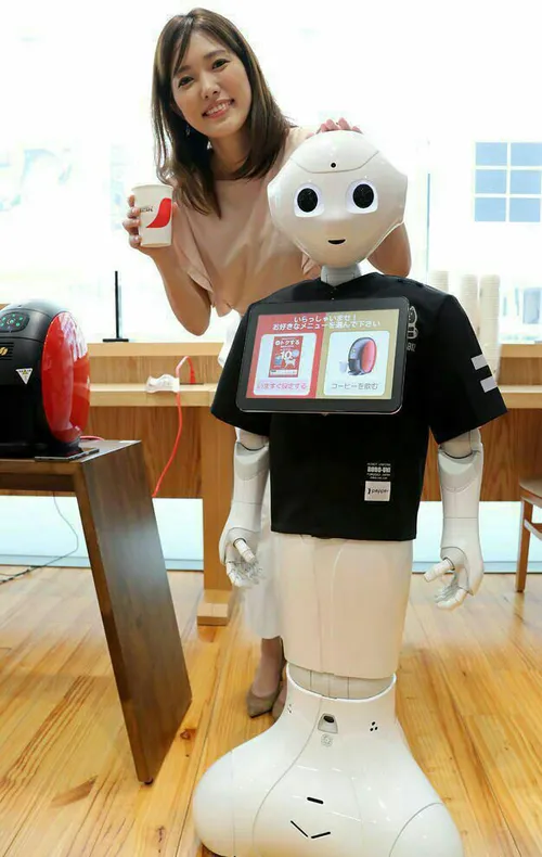 ربات آبدارچی در یک شعبه " سافت بانک " ژاپن در شهر توکیو