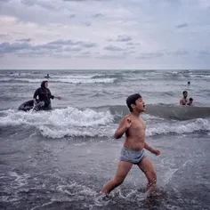 People swim in the water on the Caspian sea in north of #