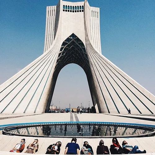 Friends get together around Azadi Tower, a 40-something-y