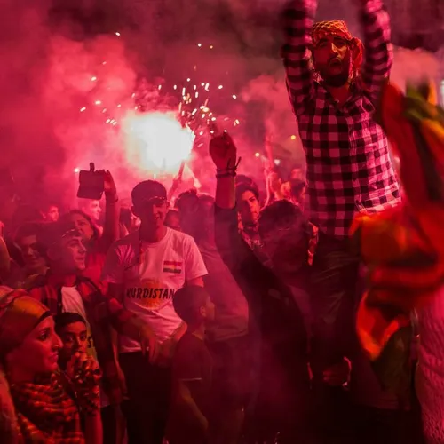 Supporters in Istanbul celebrate the pro-Kurdish Peoples'