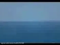 جنگنده ی فوق پیشرفته ی ایرانی که از داخل آب بیرون می آید.