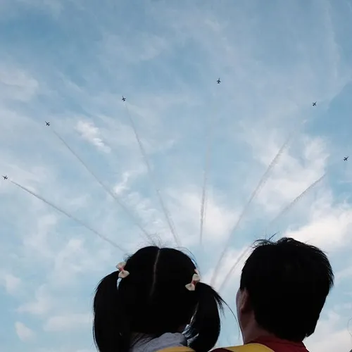 Father & Child watching the aerial display for Singapore 