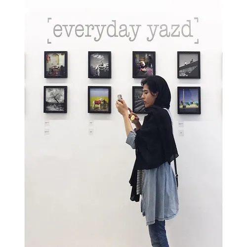 Quite ironic to see a visitor at a photo exhibition Insta
