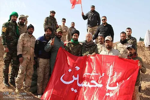 پرچم گنبد حرم امام حسین ع در عملیات موصل به اهتزاز درآمد 