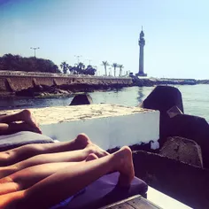 Beach legs, Beirut. Photo by Natalie Naccache @natnacphot