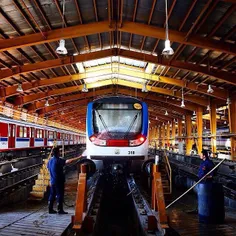 Staff members of #Tehran Metro washing a train in a railw