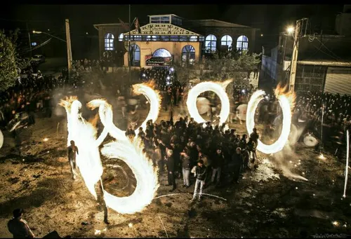 مراسم گوی اتشین یکی از مراسم سنتی در شب عاشورا در بخشی از