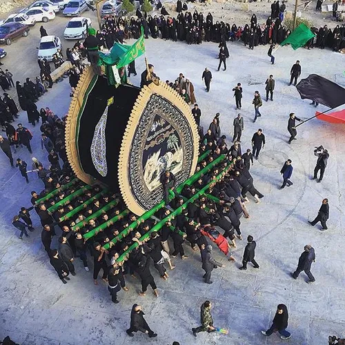 Nakhl-Gardani ceremony in Hamaneh Village on Ashura day. 