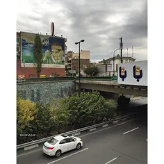 The image of a war hero is seen on a huge wall at Abbasab