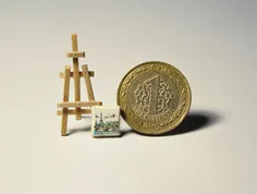 نقاشی میکروسکوپی روی کوچکترین تابلو و کوچکترین بوم دنیا