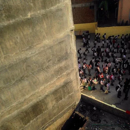 children seen gathering for school assembly in between of