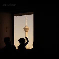 The #Milad tower is seen through the window of a doctor's
