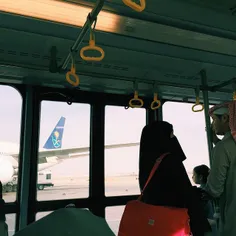 A family about to board a Saudia airlines flight to Dubai