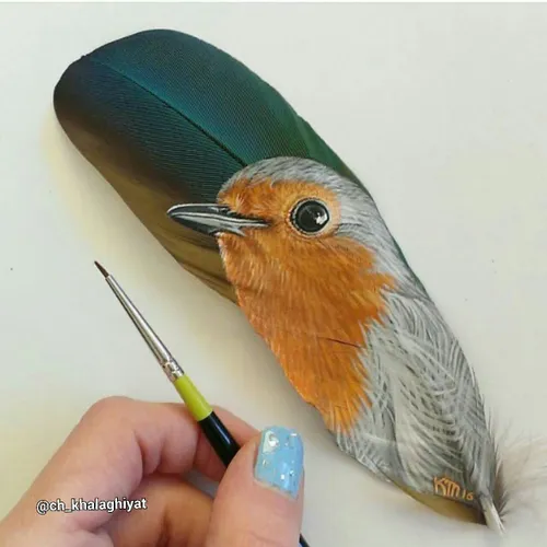 خلاقیت هنری نقاشی بر روی پر پرنده