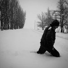 A policeman walking in the snow in Punta de Vacas during 