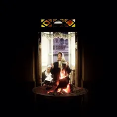 An Iranian #Zoroastrian prays during a religious ceremony