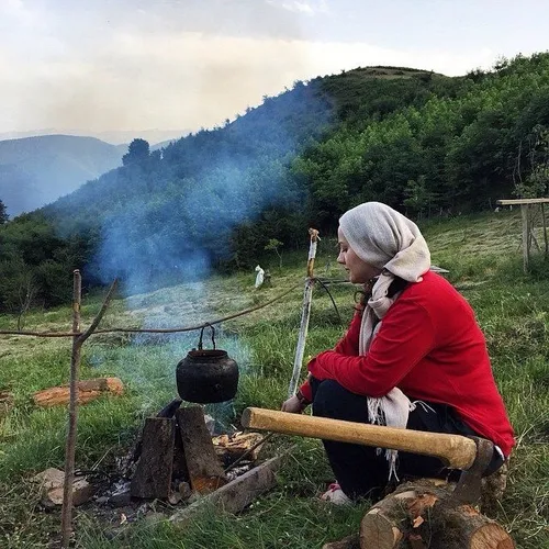 A woman makes tea in the high ground of Khalkhal, Ardabil