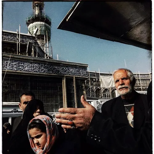 A group of Shia Muslim at the Holy Shrine of Imam Reza (t