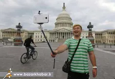 "گردشگر کره ای در واشنگتن"( شیوه عکس گرفتن از خود را یاد 