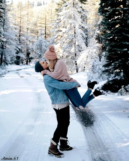 winter girl and boy kiss