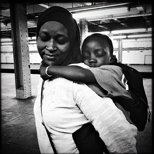 A mother and son pictured in the Bronx, New York. Photo b