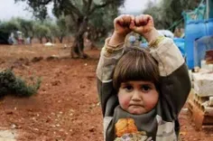 کودک سوری زمانی که عکس برداررادیدفکرداسلحست.