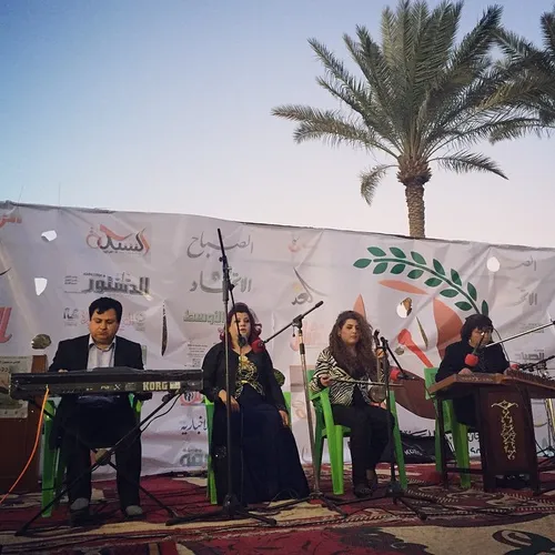 An Iraqi folklore band perform during a festival at Abu N