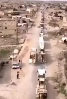 🛑تصویر هوایی از کاروان عظیم #حشد_الشعبی_عراق که جهت کمک به مردم #سوریه وارد خاک این کشور شده است