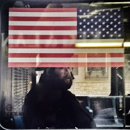 A Rabbi rides a bus in the Hasidic community of south Wil