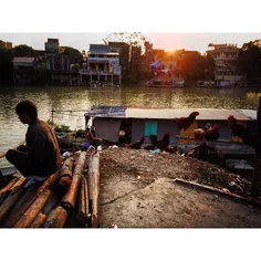 A worker get rest after working time by the river Cau in 