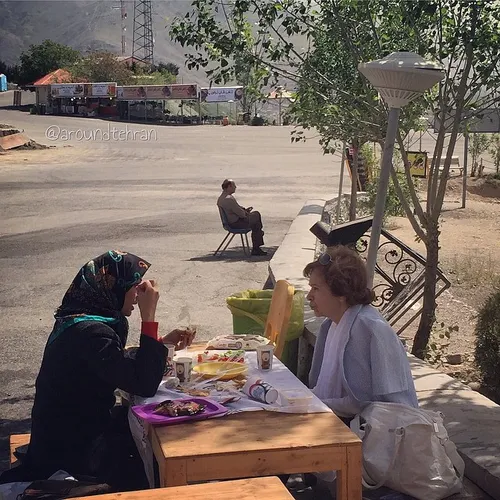Two women are having breakfast in Baam Tehran, and the ge