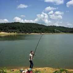 A man hooking in the lake of Saqalksar Dam. #Rasht, #Gila