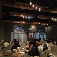 Saudi women sit and dine in the family section, in the ci